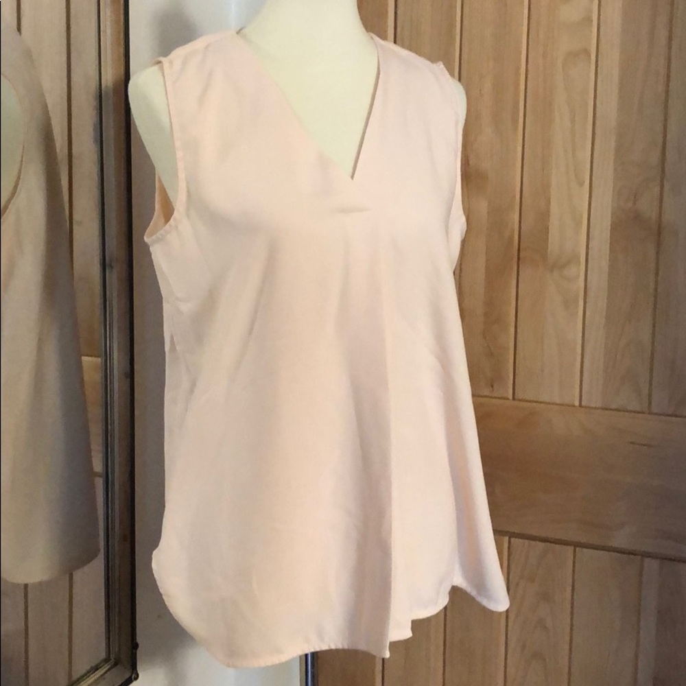 Light peach pleated blouse